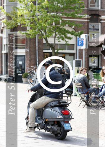 Amsterdam 31 mei 2013
Ruud Gullit op zijn vespa scooter
Peter Smulders bv