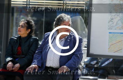 Amsterdam 21 mei 2015  
Schrijver A.F.T. v d Heijden of Adri v d Heijden met zijn vrouw wachtend op de tram.