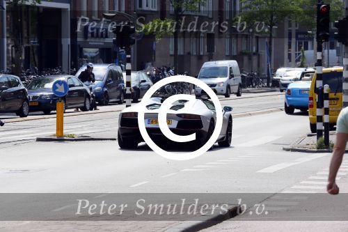 Amsterdam 27 mei 2015  
Afrojack met (een) vriendin in zijn Lambirghini Aventador op de pc hooftstraat en daarna op andere plekken in zuid. Ze zijn gaan shoppen in Louis Vuitton