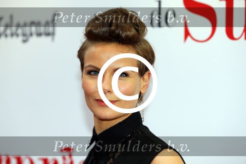 Amsterdam 18 mei 2015
Premiere de surprise van Mike v Diem met in de hoofdrollen Georgina Verbaan en Jeroen v Koningsbrugge. De premiere was in Tuschinski. Angela Schijf met man