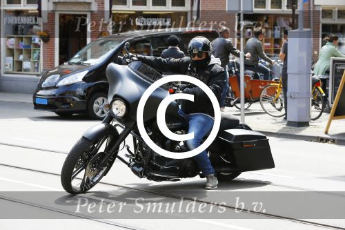 Amsterdam 27 mei 2015  
Dennis Rugenbregt op zijn Buddha to Buddha Harley Davidson motor