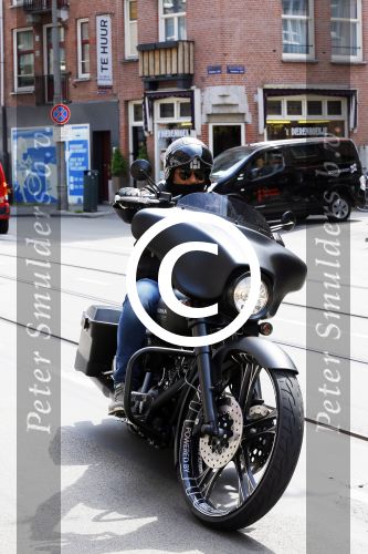 Amsterdam 27 mei 2015  
Dennis Rugenbregt op zijn Buddha to Buddha Harley Davidson motor