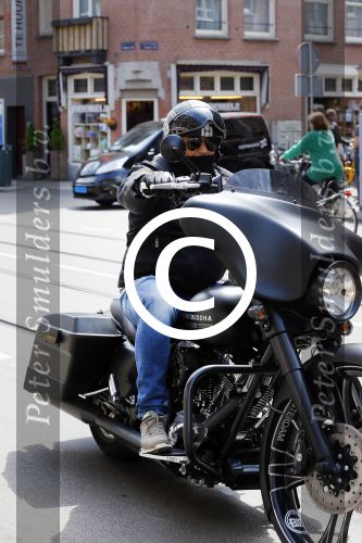 Amsterdam 27 mei 2015  
Dennis Rugenbregt op zijn Buddha to Buddha Harley Davidson motor