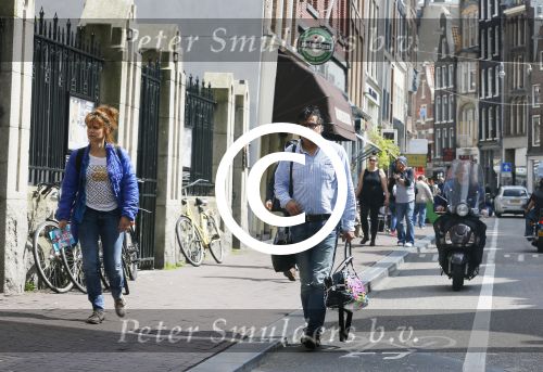 Amsterdam 8 mei 2015
Ellen ten damme met vriend en op grote abri van ziggo.