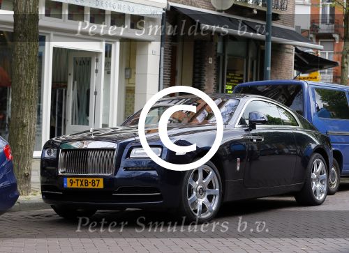 Amsterdam 9 mei 2015
Gerard Spong met zijn hondje en zijn Rolls Royce.