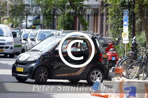 Amsterdam 7 mei 2015 
Patty Brard in haar smart de Patmobile