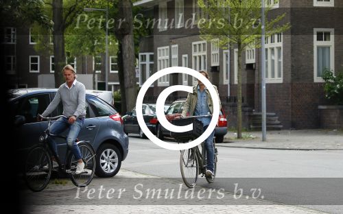 Amsterdam 20 mei 2015
Philip Cocu met een vriend op de fiets in Amsterdam.