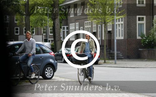 Amsterdam 20 mei 2015
Philip Cocu met een vriend op de fiets in Amsterdam.