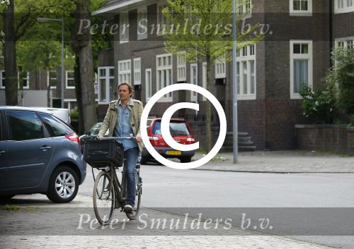 Amsterdam 20 mei 2015
Philip Cocu met een vriend op de fiets in Amsterdam.
