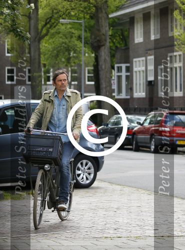Amsterdam 20 mei 2015
Philip Cocu met een vriend op de fiets in Amsterdam.