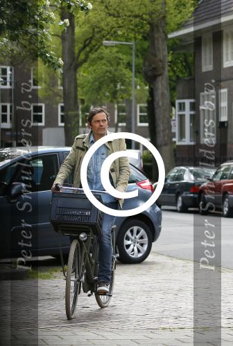 Amsterdam 20 mei 2015
Philip Cocu met een vriend op de fiets in Amsterdam.