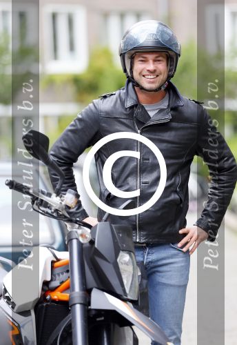 Amsterdam 27 mei 2015  
Rick Brandsteder op zijn motor in amsterdam
