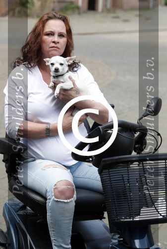Breda 11 mei 2017
Andrea van der Kaap de weduwe van Sugar Lee Hooper op haar scootmobiel