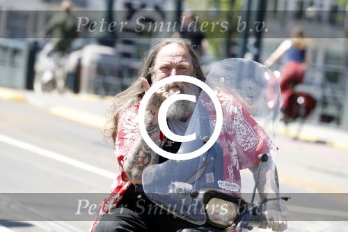 Amsterdam 26 mei 2017
Henk Schiffmacher op zijn scooter