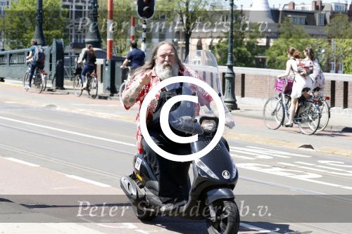 Amsterdam 26 mei 2017
Henk Schiffmacher op zijn scooter