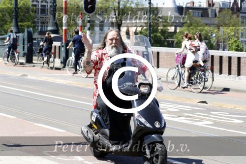 Amsterdam 26 mei 2017
Henk Schiffmacher op zijn scooter