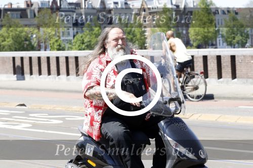 Amsterdam 26 mei 2017
Henk Schiffmacher op zijn scooter