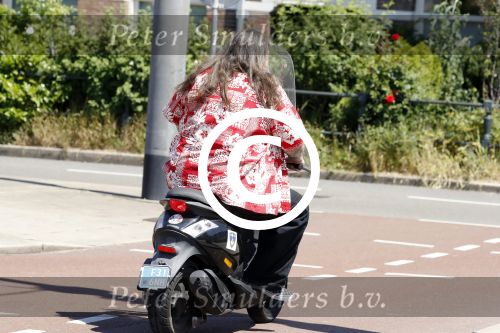 Amsterdam 26 mei 2017
Henk Schiffmacher op zijn scooter