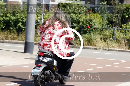 Amsterdam 26 mei 2017
Henk Schiffmacher op zijn scooter
