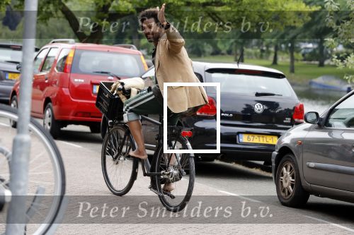 Amsterdam 23 mei 2018
Mike Libanon met blote voeten op de fiets.