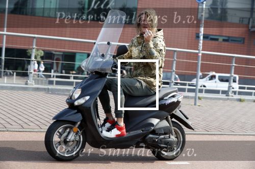 Amsterdam 29 mei 2018
Tygo Gernandt met sigaret op zijn scooter.