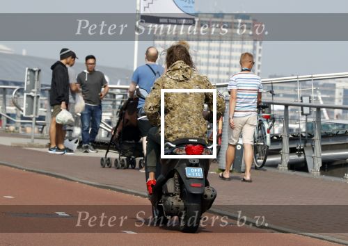 Amsterdam 29 mei 2018
Tygo Gernandt met sigaret op zijn scooter.