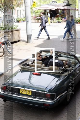 Amsterdam 29 mei 2021
Beau v Erven Dorens in zij Jaguar cabriolet in het centrum van Amsterdam.