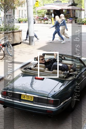Amsterdam 29 mei 2021
Beau v Erven Dorens in zij Jaguar cabriolet in het centrum van Amsterdam.