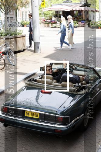 Amsterdam 29 mei 2021
Beau v Erven Dorens in zij Jaguar cabriolet in het centrum van Amsterdam.