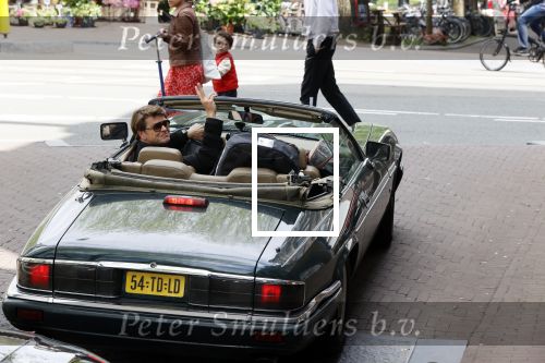 Amsterdam 29 mei 2021
Beau v Erven Dorens in zij Jaguar cabriolet in het centrum van Amsterdam.