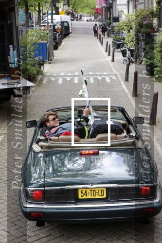 Amsterdam 29 mei 2021
Beau v Erven Dorens in zij Jaguar cabriolet in het centrum van Amsterdam.