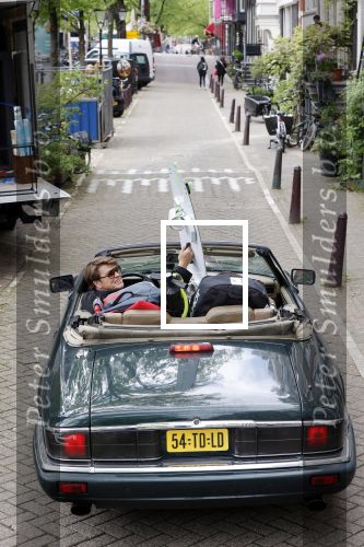 Amsterdam 29 mei 2021
Beau v Erven Dorens in zij Jaguar cabriolet in het centrum van Amsterdam.