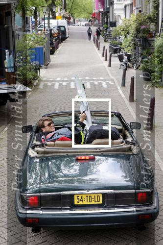 Amsterdam 29 mei 2021
Beau v Erven Dorens in zij Jaguar cabriolet in het centrum van Amsterdam.