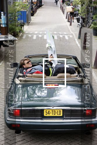 Amsterdam 29 mei 2021
Beau v Erven Dorens in zij Jaguar cabriolet in het centrum van Amsterdam.