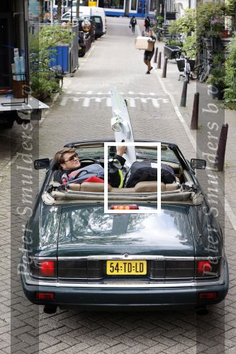 Amsterdam 29 mei 2021
Beau v Erven Dorens in zij Jaguar cabriolet in het centrum van Amsterdam.