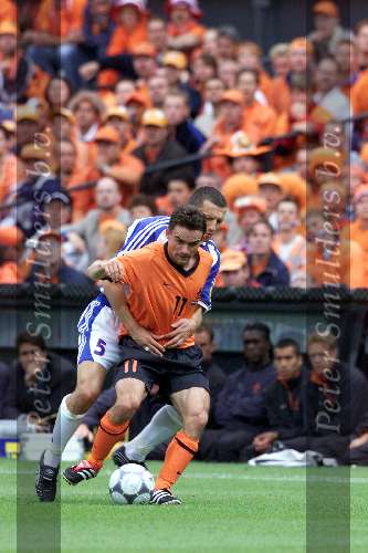 Rotterdam, 25 juni 2000   Euro 2000
Nederland-Yougoslavie, eindstand 6-1
Marc Overmars in duel met Djukic
Overtreding
Europees Kampioenschap Voetbal 2000