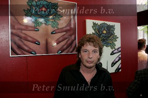Amsterdam 6 juni 2004
Expositie  stip gallery in amsterdam.
Edwin Jansen met Tatoeage van zijn vriendin