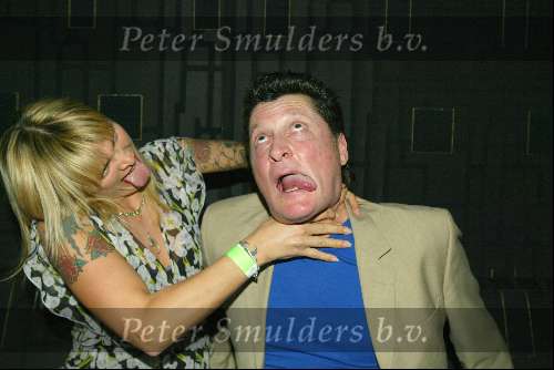 Amsterdam 3 maart 2004
Presentatie nieuw magazine Jacky in Jimmy Woo.
Barry Hay met vrouw   Tatoeage