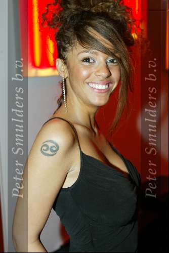 Amstelveen 27 maart 2004
Presentatie nieuwe Powerplate bij special sports.
Fajah Lourens met tatoeage