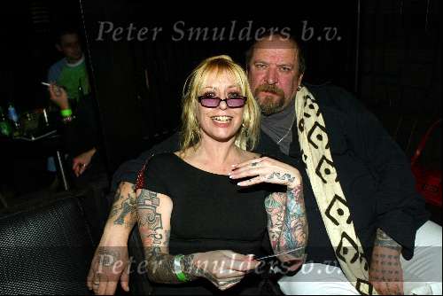 Amsterdam 3 maart 2004
Presentatie nieuw magazine Jacky in Jimmy Woo.
Henk Schiffmacher met vrouw en tatoeage