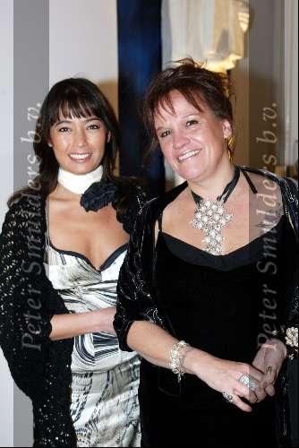 Wernhout 28 maart 2003
Princess Model of the year verkiezing.
Xandra Brood met collega
Tatoeage
