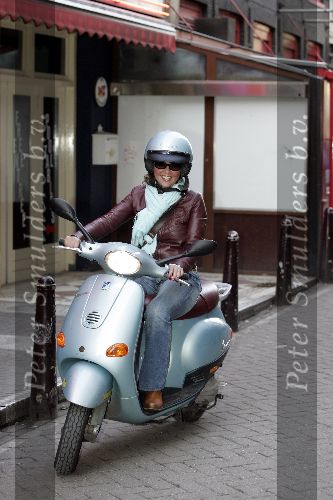 Amsterdam 23 maart 2005
Josefine v Asdonk op  Vespa scooter in Amsterdam