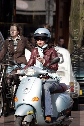 Amsterdam 24 maart 2005
Josefine v Asdonk op  Vespa scooter met gsm