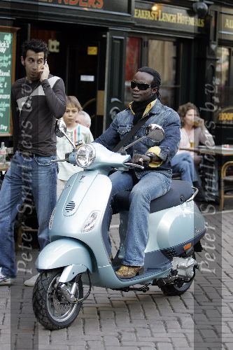 Amsterdam 23 maart 2005
Regilio Tuur op Vespa scooter in Amsterdam