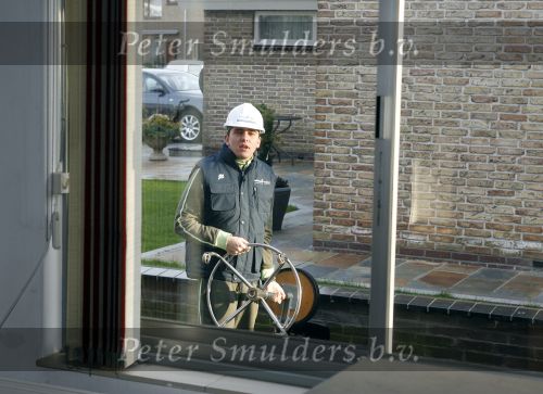 Volendam 17 februari 2007
Jan Smit is bij de sloop van het huis dat hj gekocht heeft. Op deze plek wordt xijn nieuwe huis gebouwd.