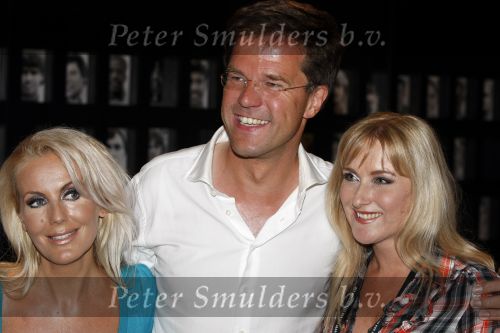 Amsterdam 13 juni 2009
De Toppers in concert in de arena met Rene Froger Gordon en Jeroen v d Boom. Mark Rutte met Mandy Huydts
Peter Smulders bv
