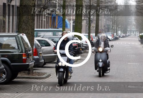 Amsterdam 3 maart 2012
Bridget Maasland met vriend op scooters in amsterdam.
Peter Smulders bv