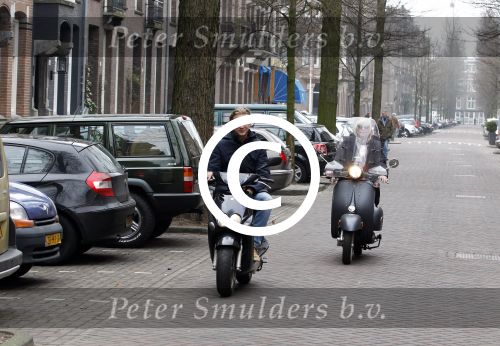 Amsterdam 3 maart 2012
Bridget Maasland met vriend op scooters in amsterdam.
Peter Smulders bv
