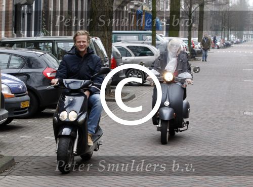 Amsterdam 3 maart 2012
Bridget Maasland met vriend op scooters in amsterdam.
Peter Smulders bv