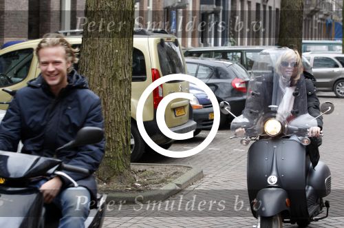 Amsterdam 3 maart 2012
Bridget Maasland met vriend op scooters in amsterdam.
Peter Smulders bv